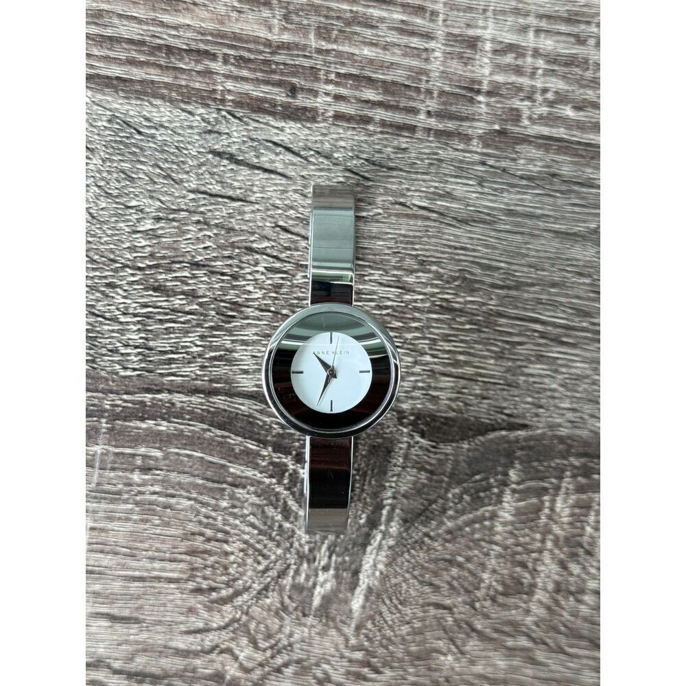 Anne Klein Silver - Toned Ceramic Bangle Ladies Wrist Watch needs  battery